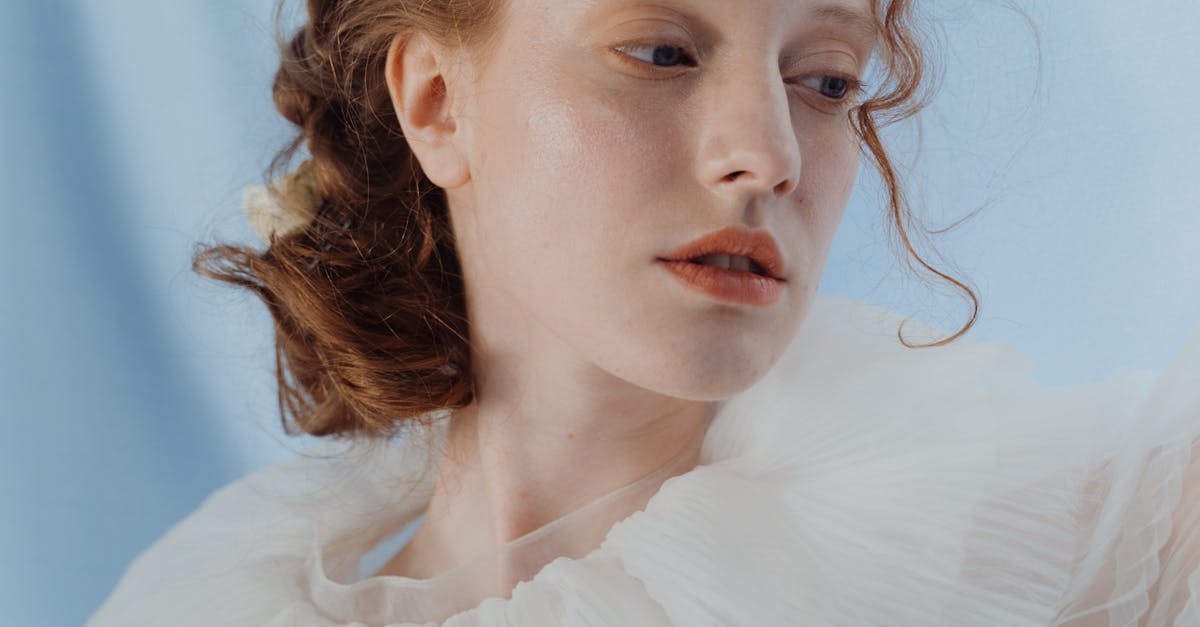 Sleek Updo with Side Part for Wedding Hair